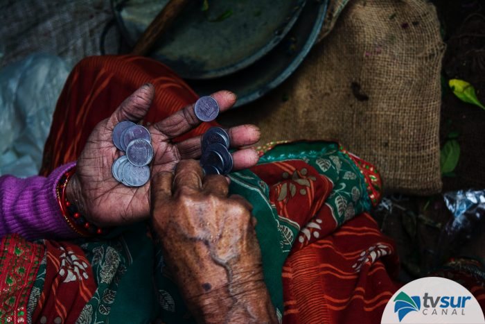 person-holding-coins-874684